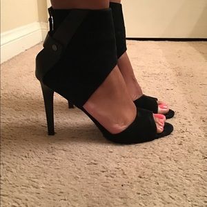 Joe’s Jeans black suede and black leather heels.